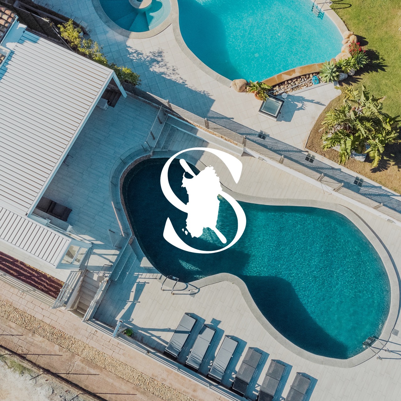 Sardinia Management luxury resort pool aerial view